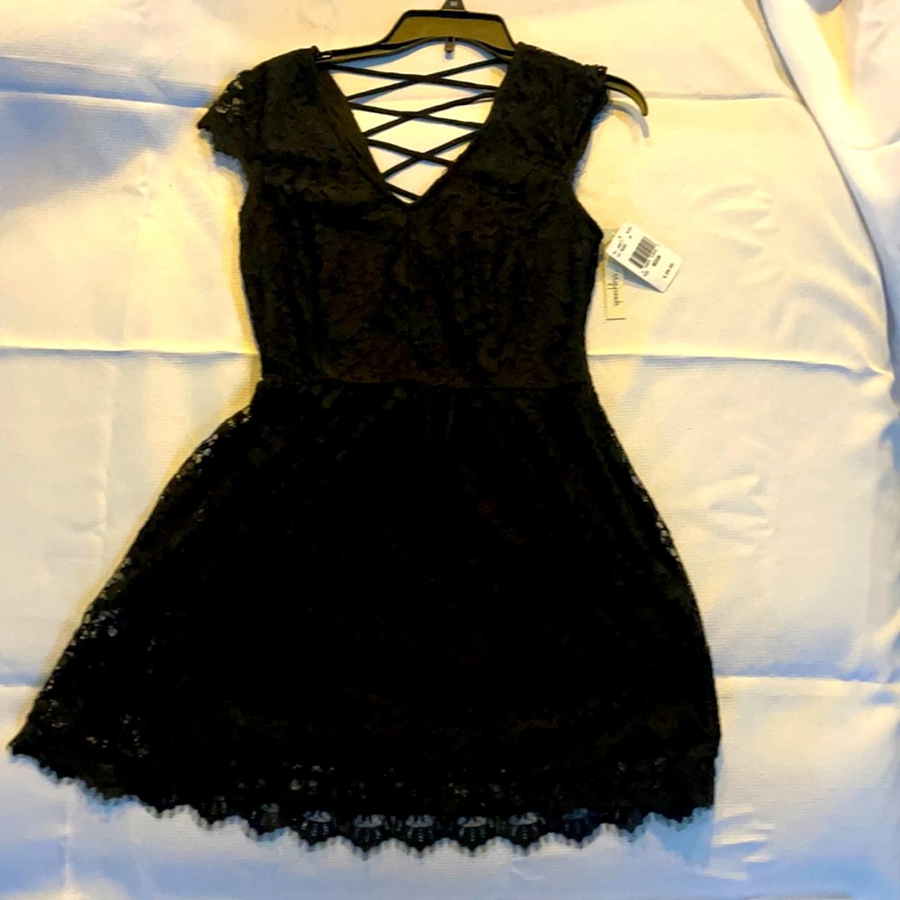 This is a nice little black dress with cross back.